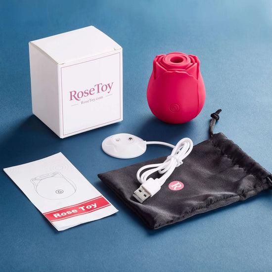 The Rose by RoseToy package contents including the magnetic charging cable, storage pouch and user manual