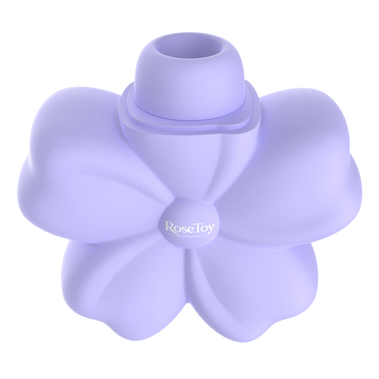 Side view of the Cherry Blossom clitoral suction vibrator with its flower-shaped silicone body